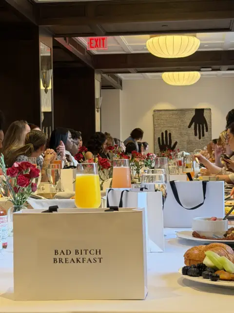 Bad Bitch Breakfast table scape with all attendees in conversation and vibrant energy